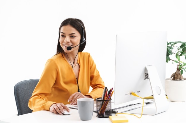 portrait-pretty-hotline-assistant-woman-wearing-microphone-headset-speaking-with-customer-by-phone-while-working-office_171337-95324